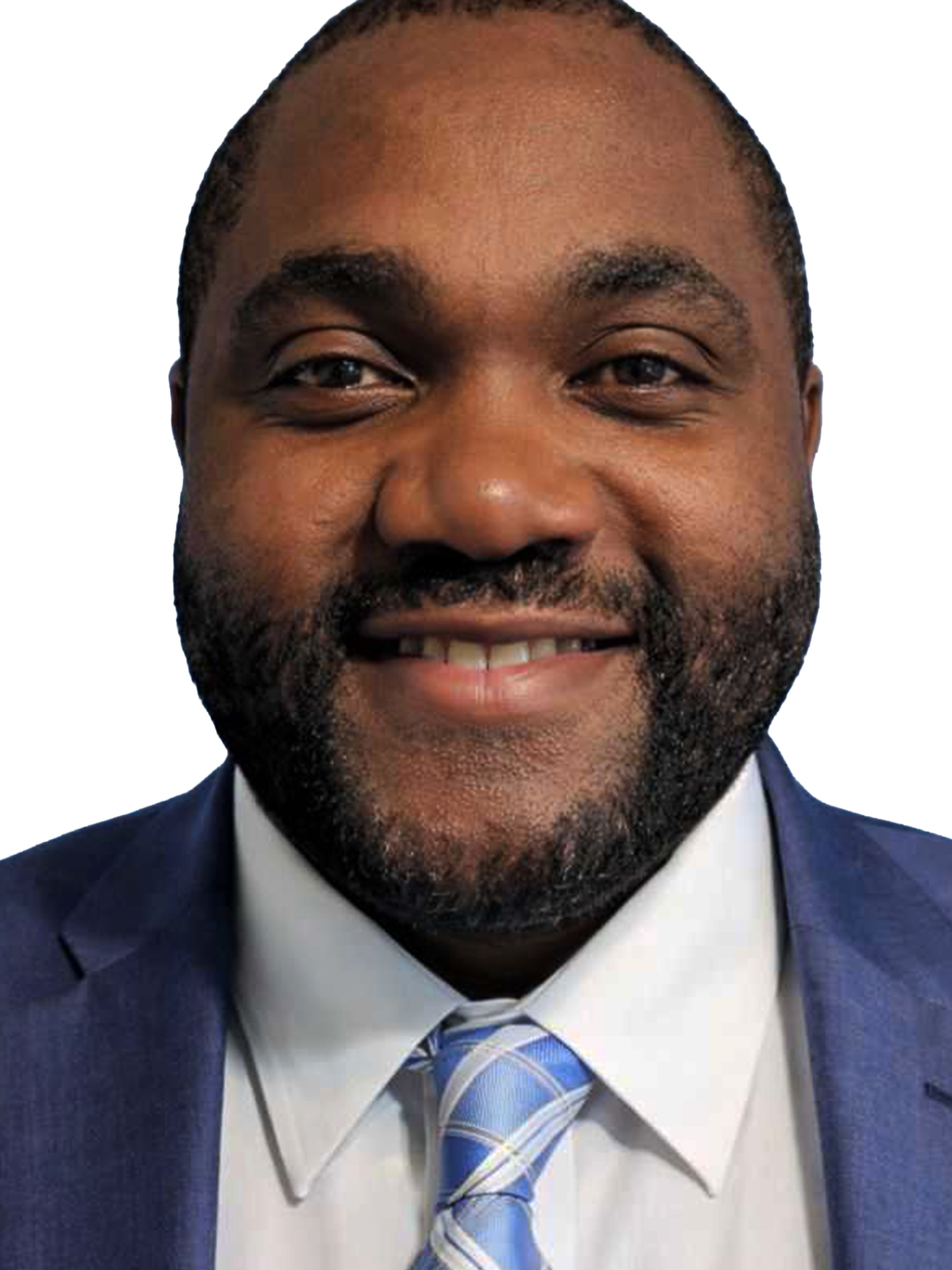 A headshot of a smiling Black man wearing a blue suit, white shirt, and patterned blue tie.