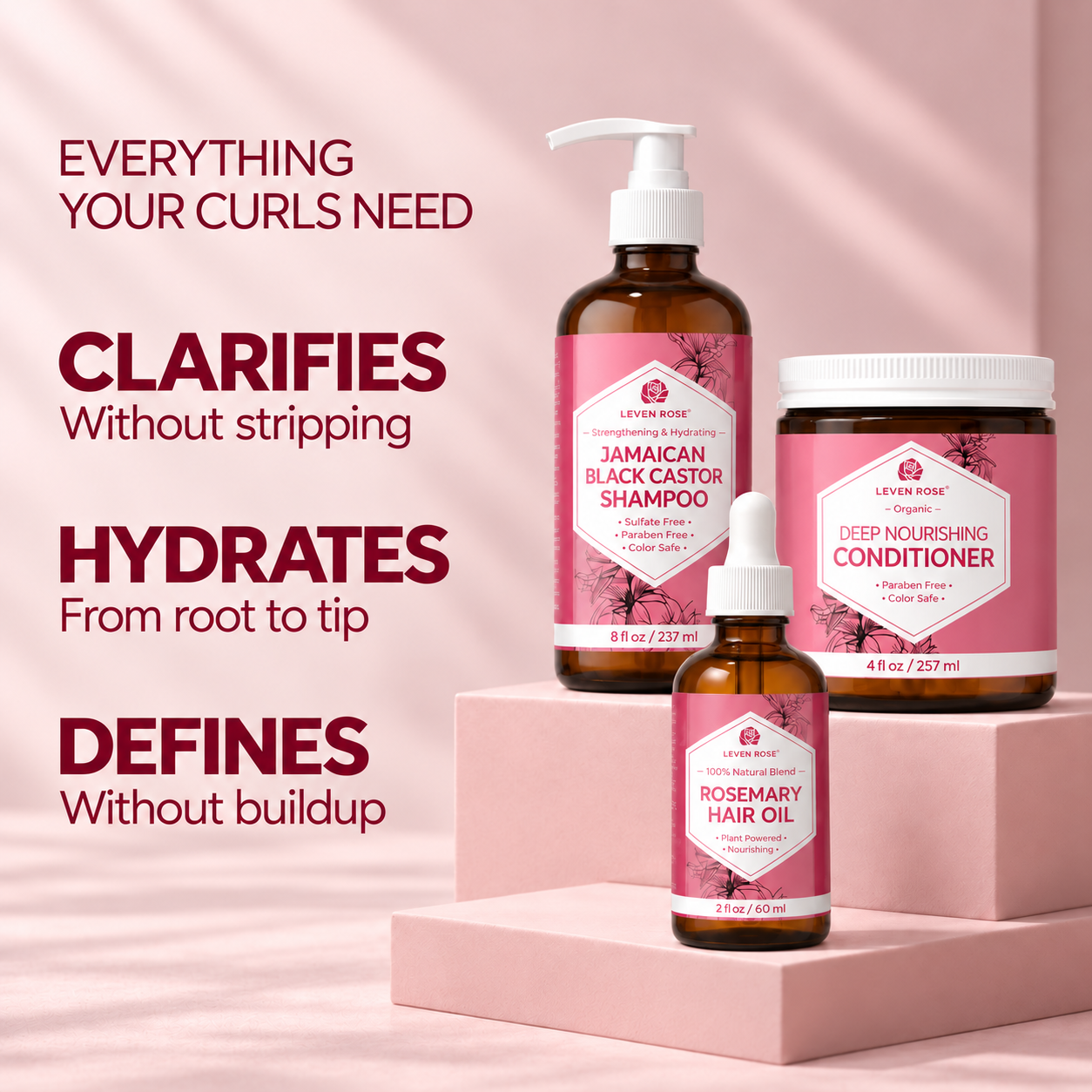 Leven Rose hair care products: shampoo, conditioner, and hair oil displayed on pink blocks.