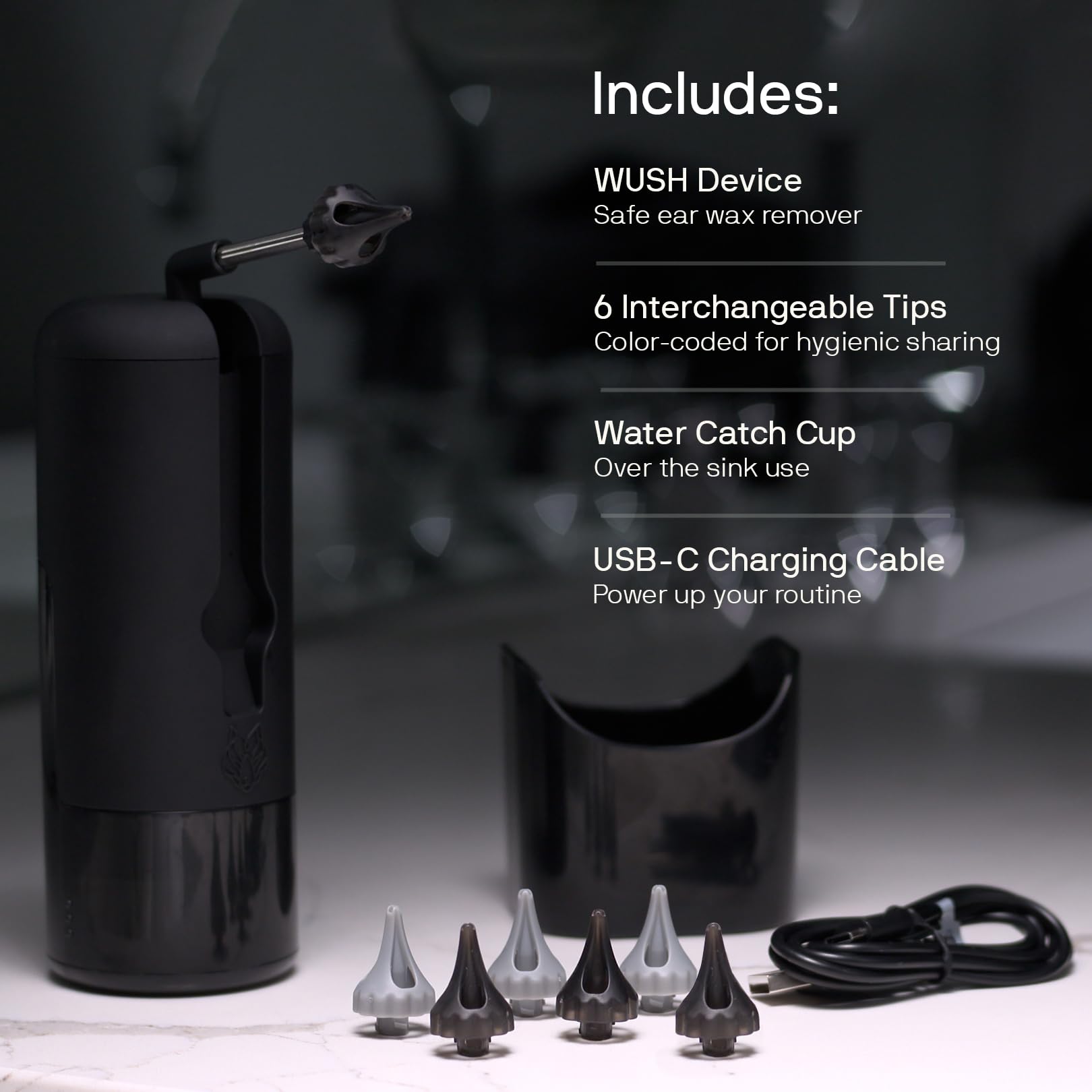 Ear wax remover kit with device, tips, catch cup, and USB-C cable.