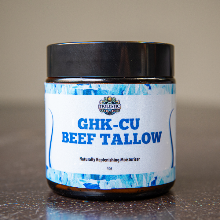 Jar labeled 'GHK-CU Beef Tallow' moisturizer on a reflective surface.