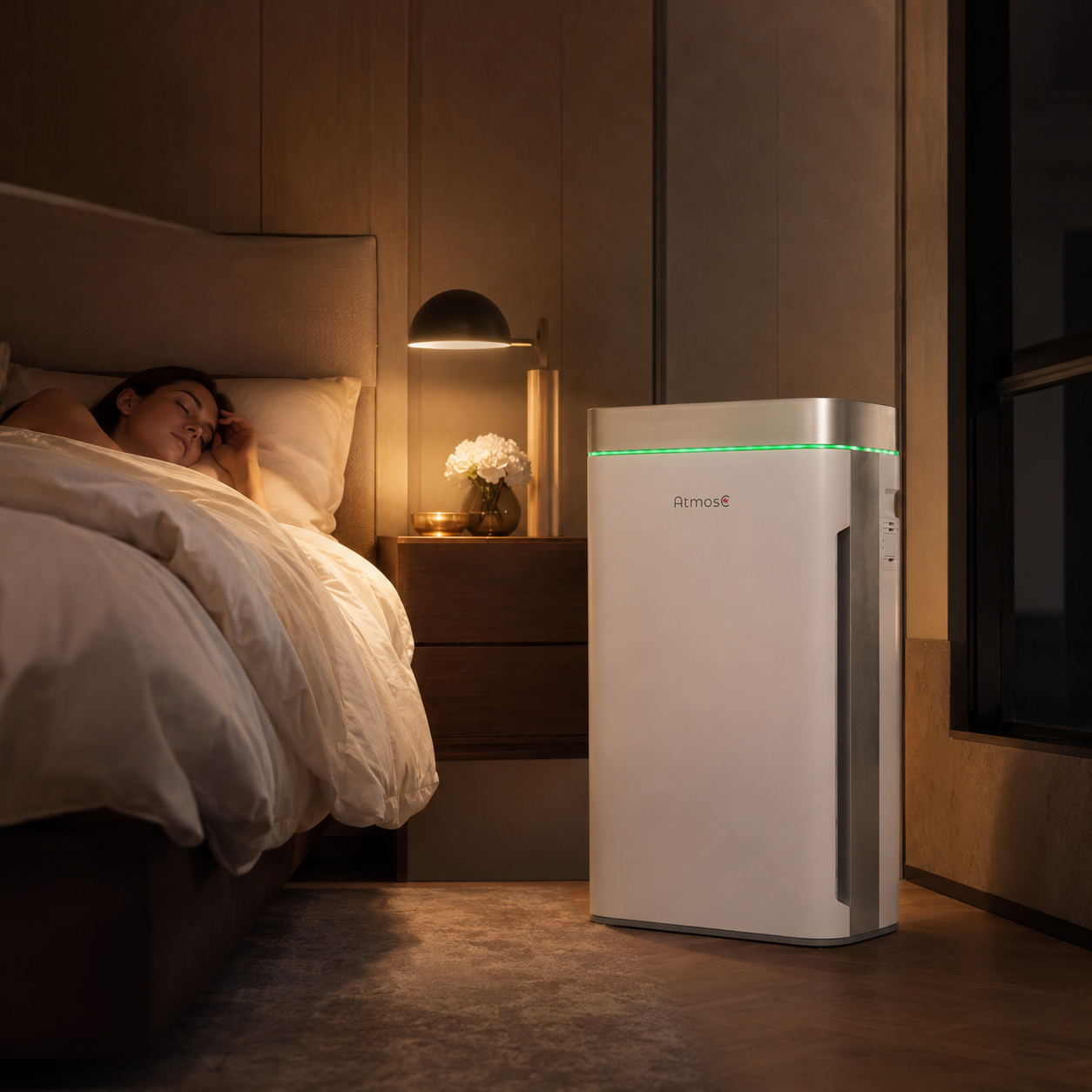 A white air purifier with a green light sits on the floor of a modern living room.