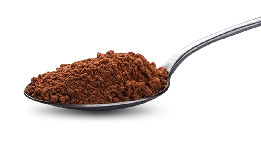 A spoon filled with cocoa powder on a white background.