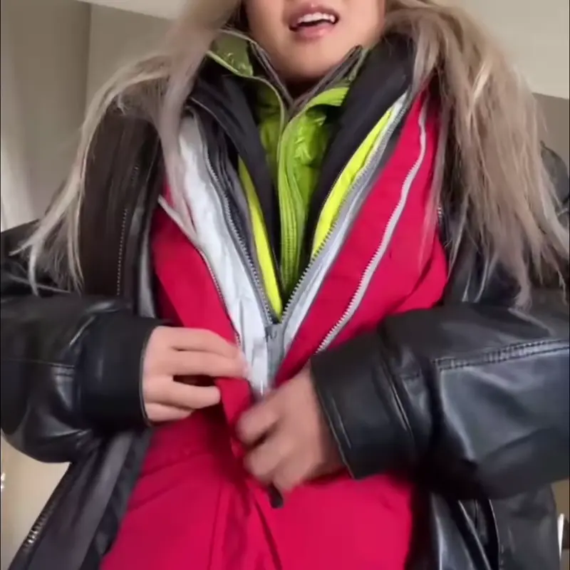 Person wearing multiple layers of jackets.