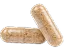 Two tan, speckled supplement capsules against a white background.
