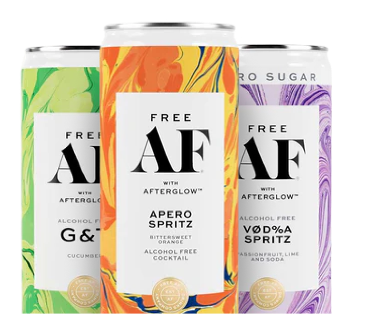 Colorful cans of alcohol-free cocktails with abstract designs on labels.