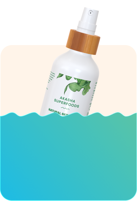 A spray bottle labeled 'Akasha Superfoods' with a wooden cap and leaf design.