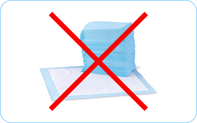 A stack of blue disposable underpads with a large red X drawn over the image.