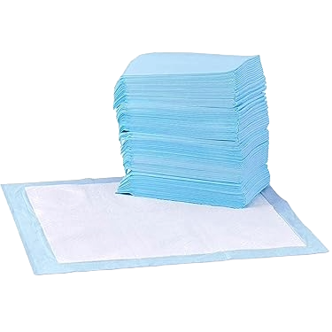 A stack of light blue and white disposable pads with one unfolded in the foreground.