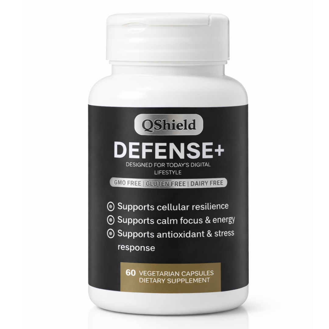 A white bottle of QShield Defense+ dietary supplement against a white background.