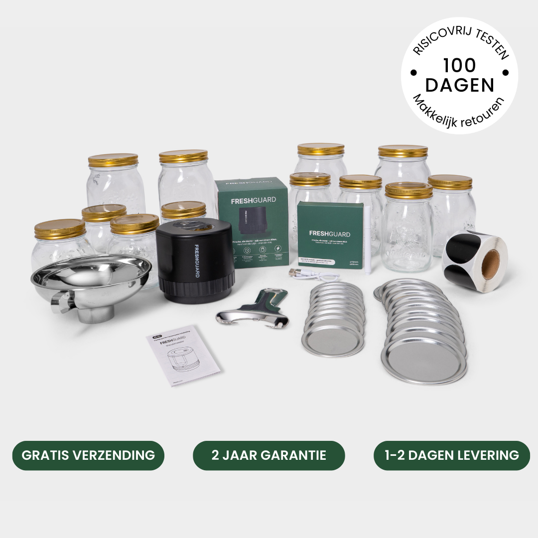 A Freshguard vacuum sealing kit with glass jars, lids, a funnel, and other accessories on a white background.