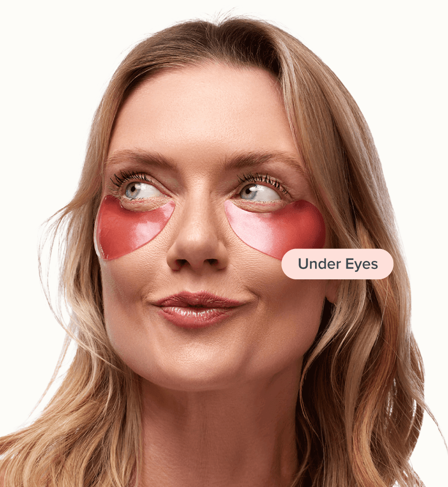 Woman with pink under-eye patches and a label reading 'Under Eyes.'