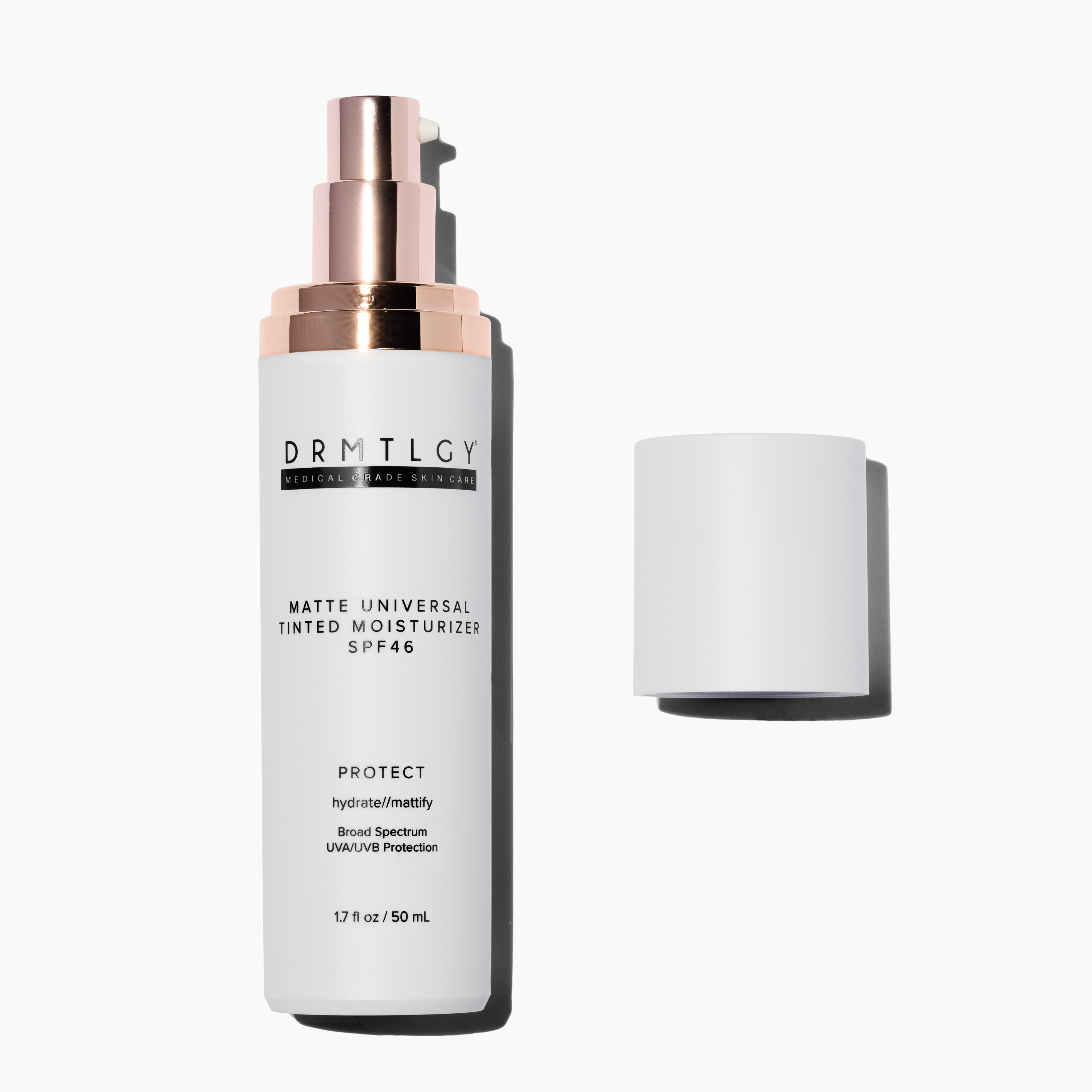 White bottle of DRMTLGY tinted moisturizer with cap removed.