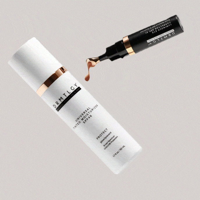 a white bottle with black liquid over it