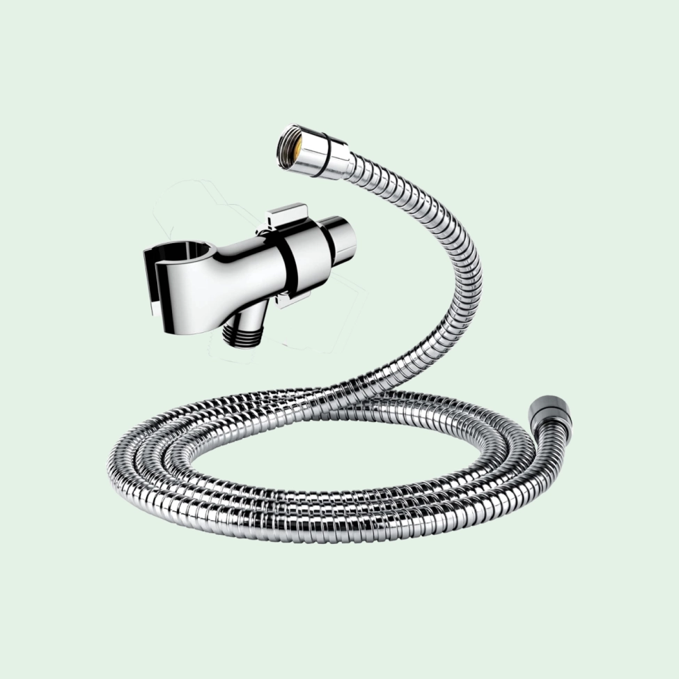 Chrome shower hose and diverter valve on a light green background.