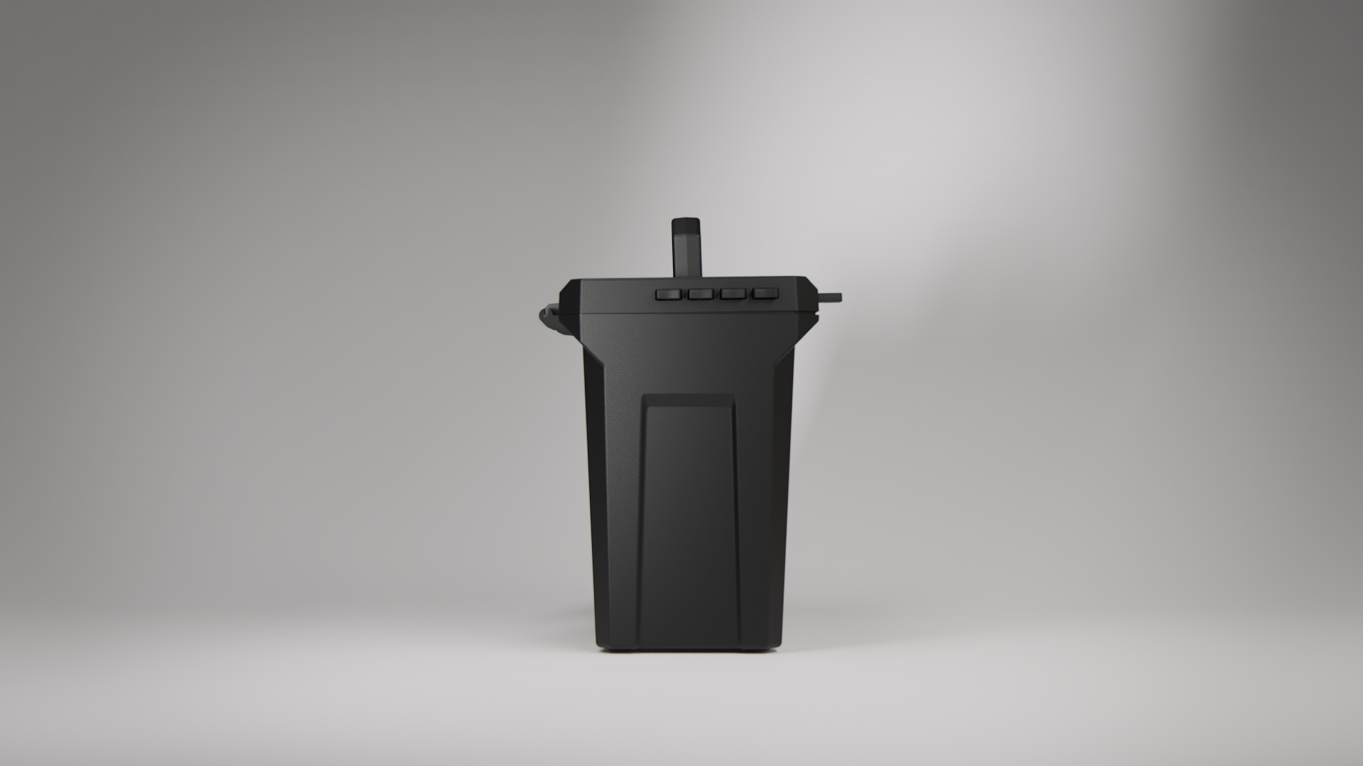 A tall, matte black, angular device standing against a plain light gray background.