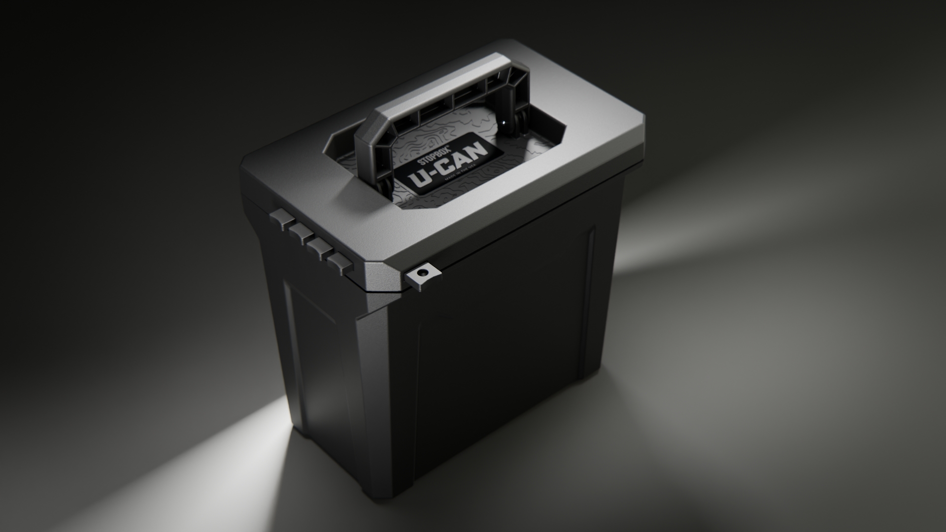 A dark gray STOPBOX U-CAN utility container with a handle, shown on a simple gray background.