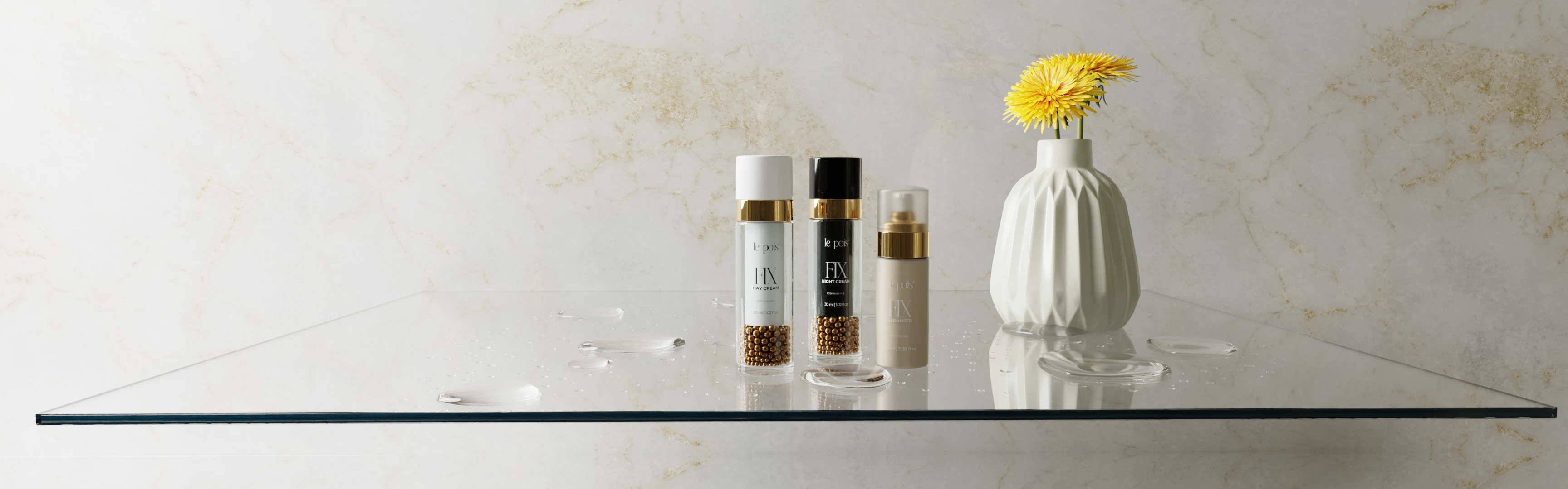 Skincare bottles on glass shelf with a white vase and yellow flowers.