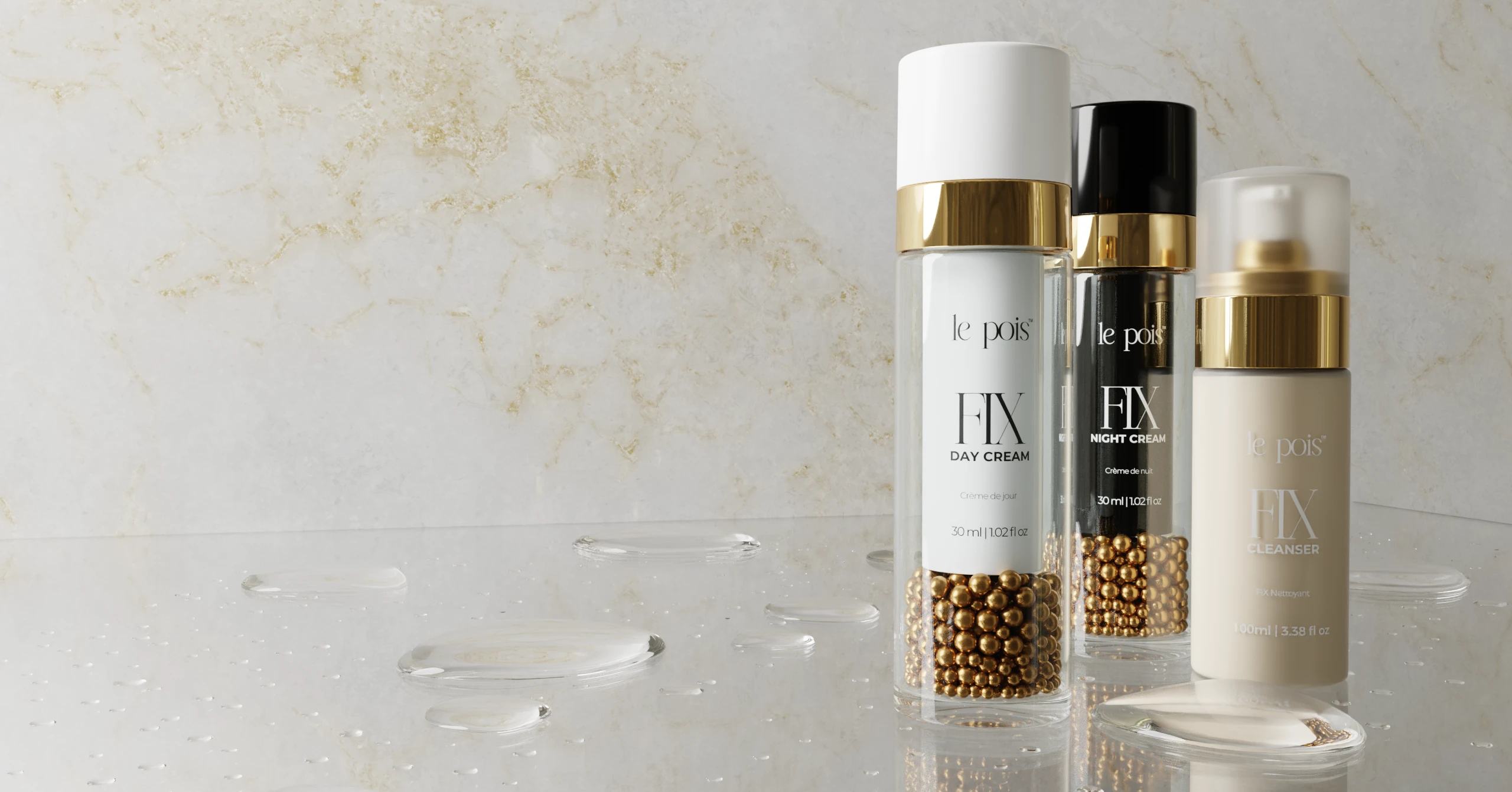 Three skincare products with gold accents on a marble surface with water droplets.