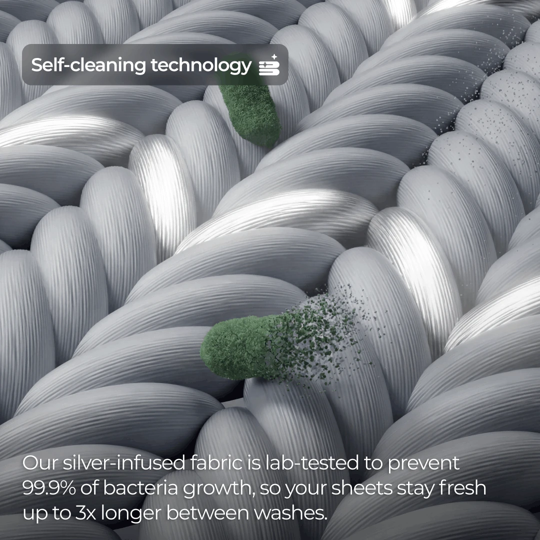 A microscopic view of woven fabric, with illustrations of bacteria being broken down on its surface.