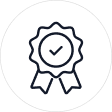 An icon of an award ribbon with a checkmark in the center, inside a white circle.
