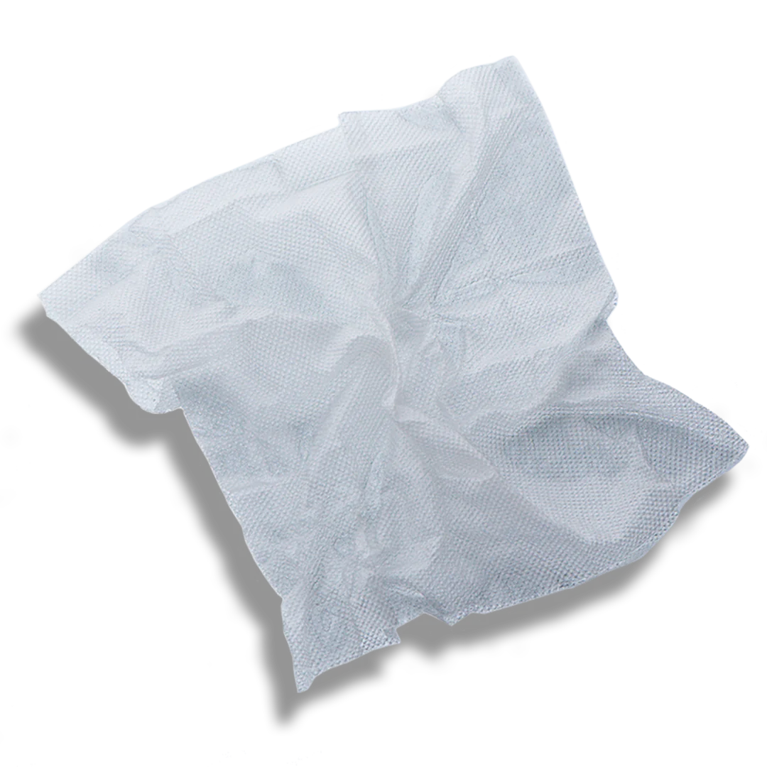 Crumpled white textured cloth against a plain background.