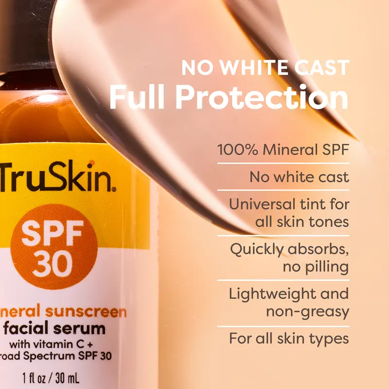 A bottle of TruSkin SPF 30 mineral sunscreen with a product smear and a list of its benefits.