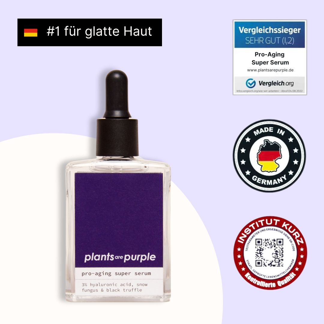 Bottle of 'plants are purple' pro-aging serum with German quality seals.