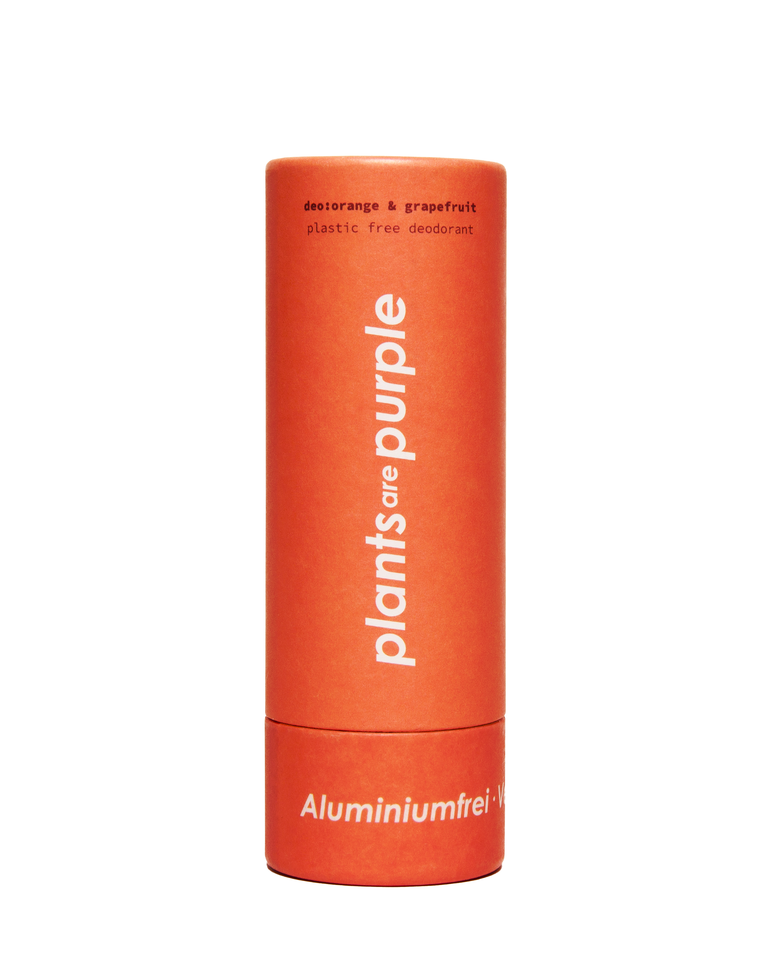 Orange cylindrical deodorant container with white text, 'plants are purple.'