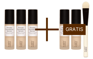 Four foundation bottles, a brush, and a 'gratis' label.