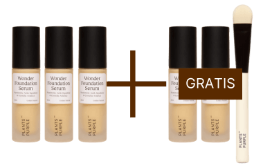 Four foundation bottles with a brush labeled 'gratis'.