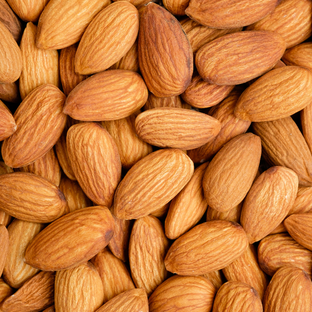 Close-up of a pile of raw almonds.