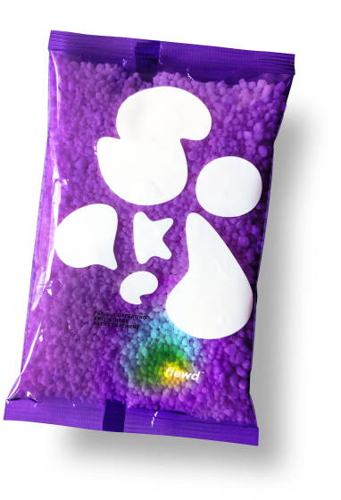 Purple bag with geometric shapes and small granules inside.