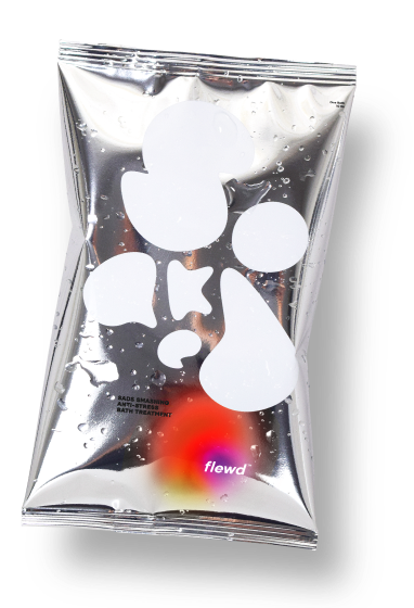 Silver packaging with abstract white shapes and 'flewd' text at the bottom.