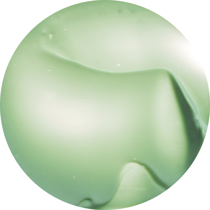 Close-up of smooth, light green cream texture.