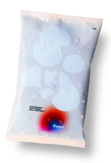 Clear packaging with abstract shapes and a red circle, labeled 'flowd'.