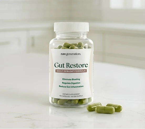 Bottle of green capsules labeled 'Gut Restore' on a kitchen counter.