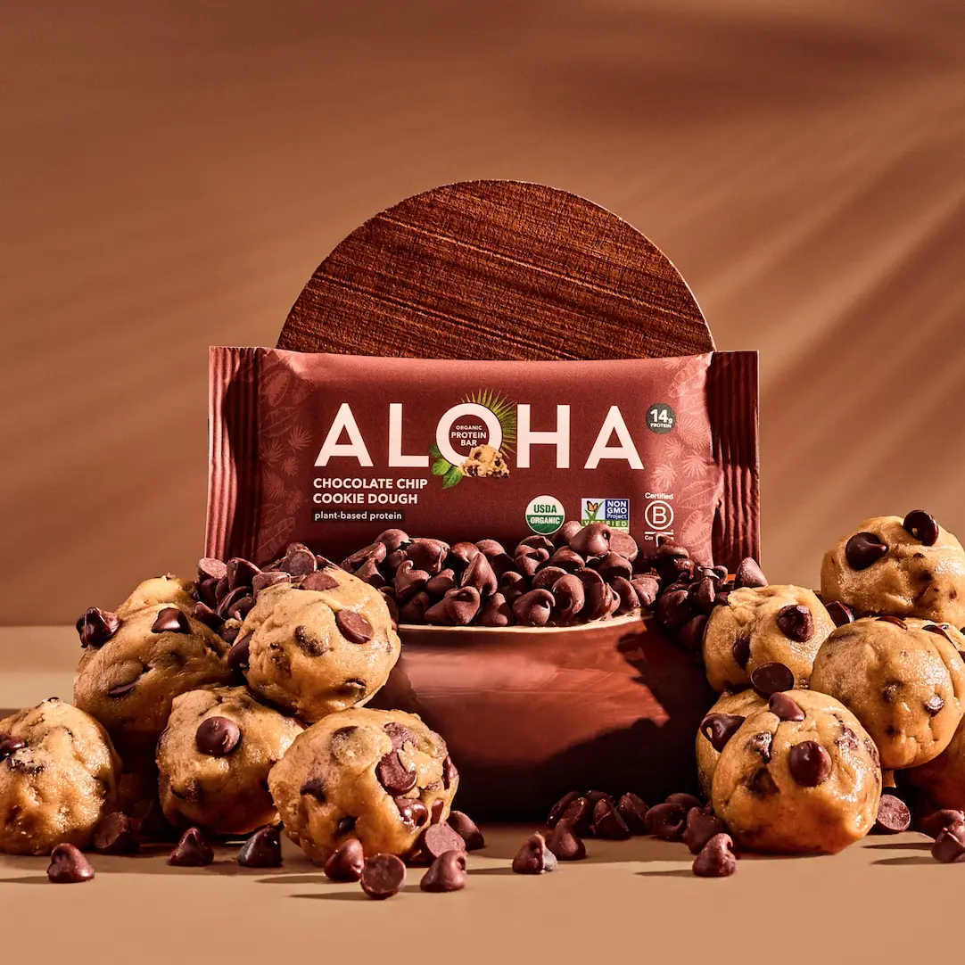Aloha chocolate chip cookie dough protein bar with chocolate chips and dough balls.
