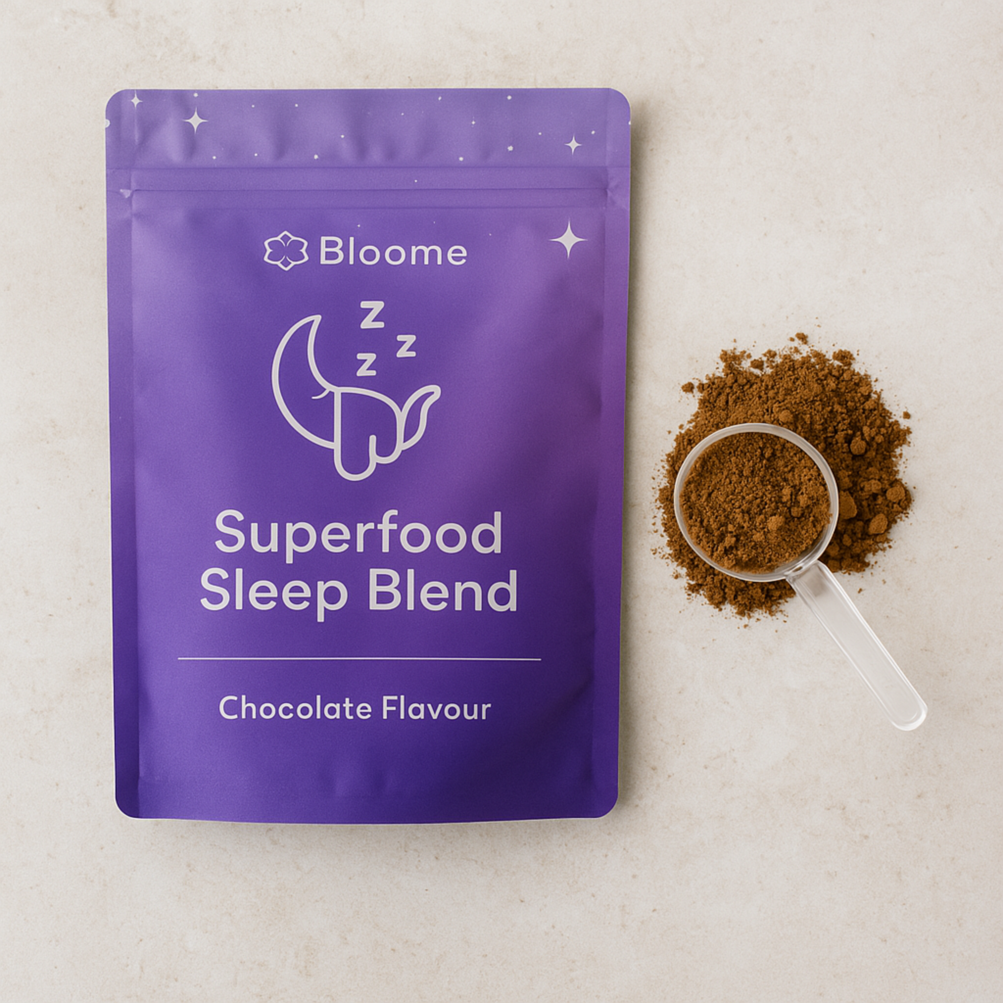Purple pouch labeled 'Superfood Sleep Blend' with a scoop of brown powder beside it.
