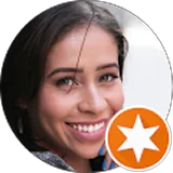 A circular headshot of a smiling woman with an orange badge featuring a white six-pointed star.