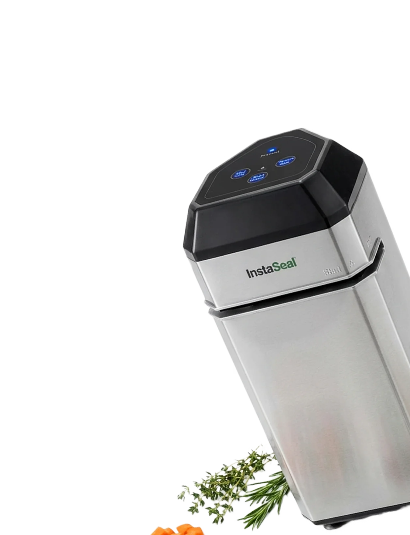 Silver kitchen appliance with control buttons, herbs, and carrots.