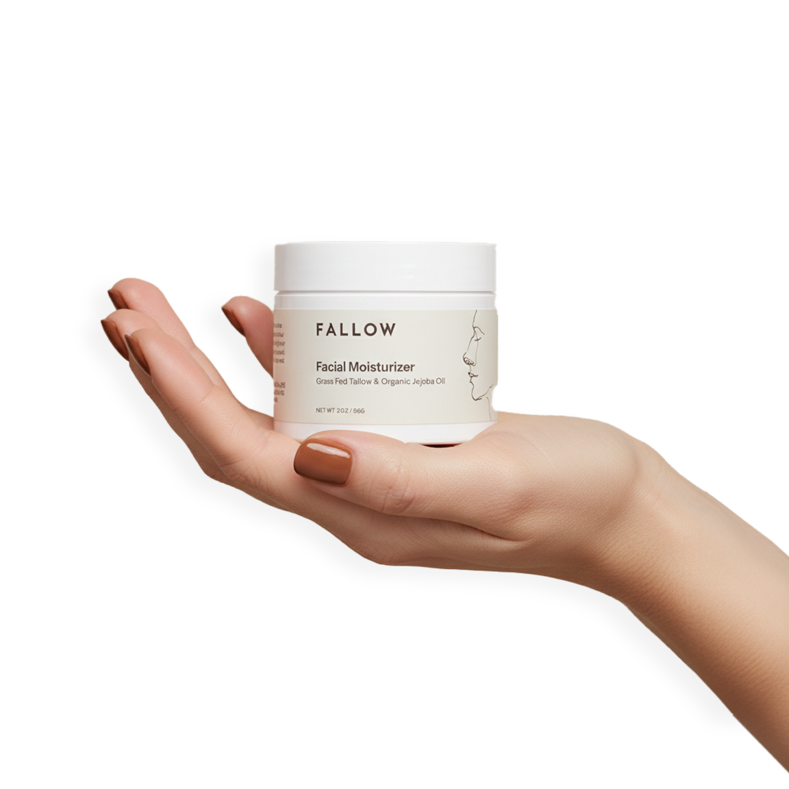 A hand holding a jar of facial moisturizer labeled 'Fallow.'
