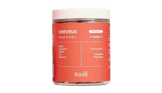 Jar of Naali hair growth gummies on a white background.