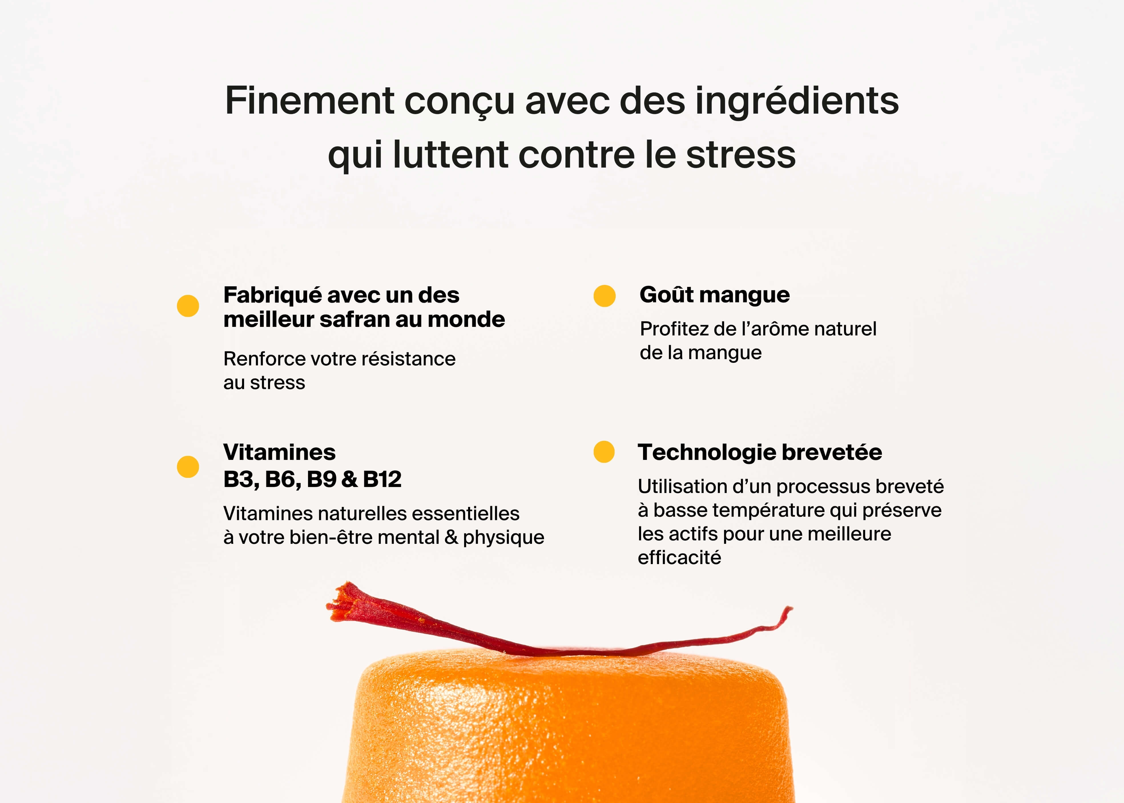Text about stress-relief ingredients and an orange object with a red saffron strand on top.