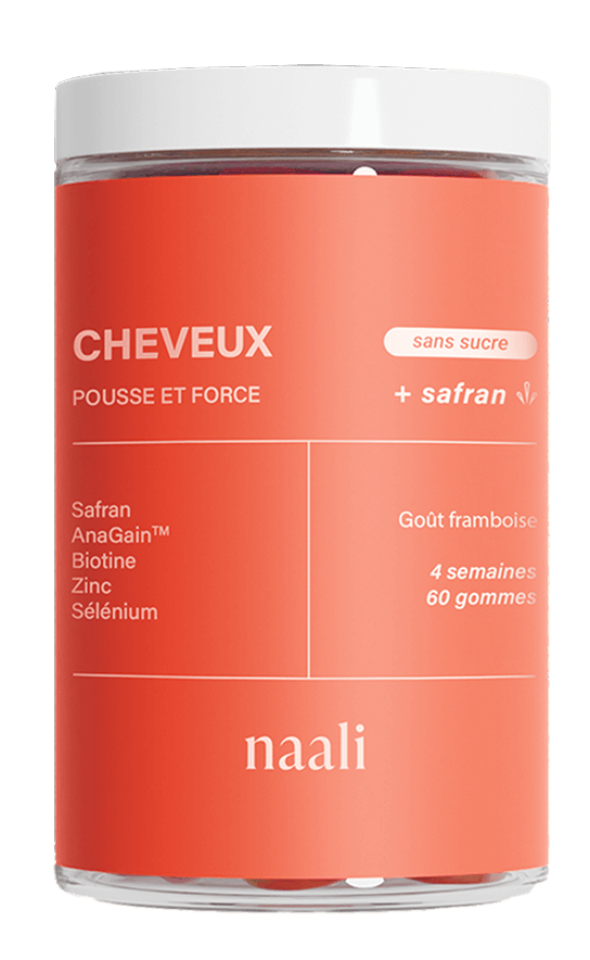 A jar of Naali hair gummies with saffron, biotin, and zinc for strength and growth.