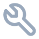 Gray wrench icon on a transparent background.