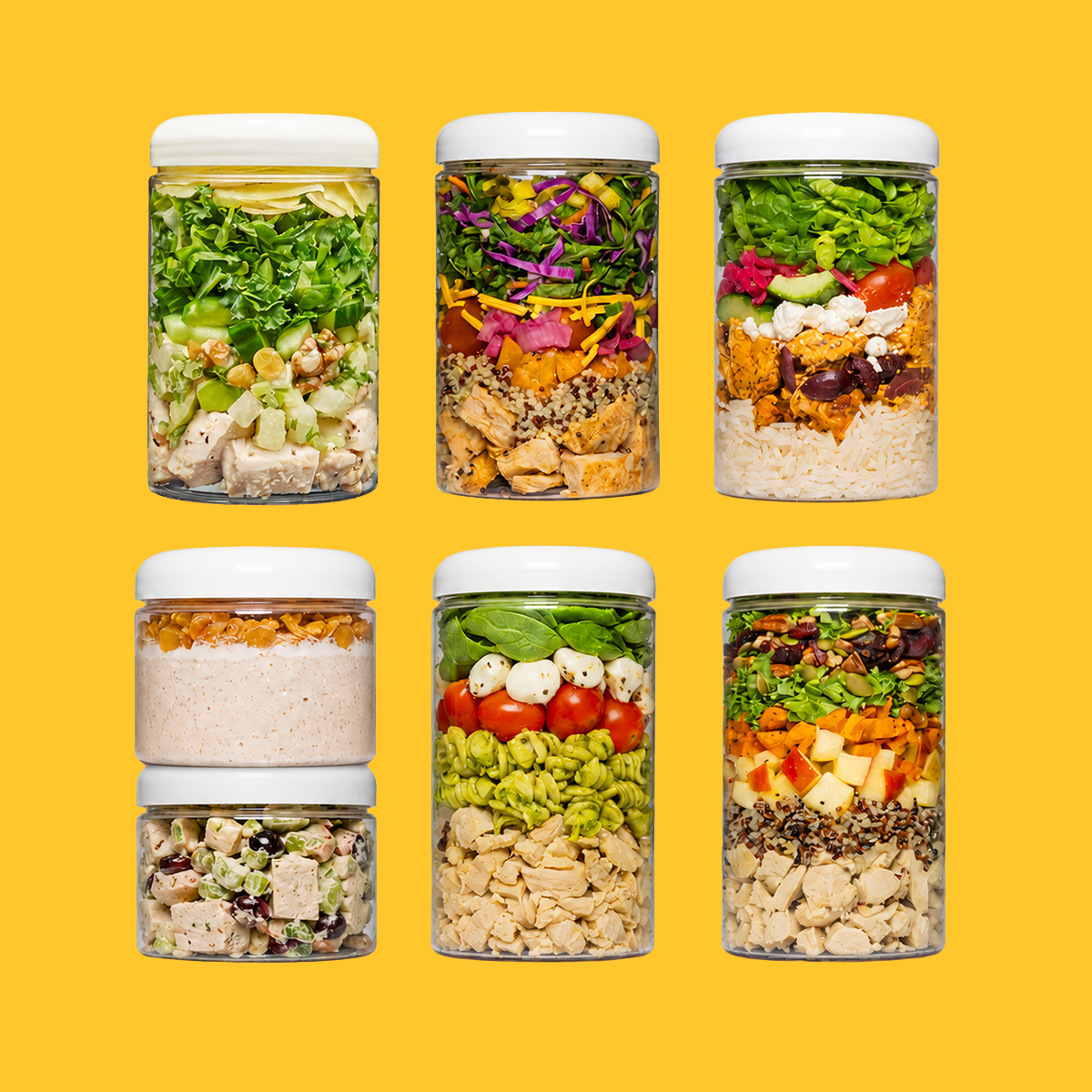Seven clear jars filled with layered salads and meals against a bright yellow background.