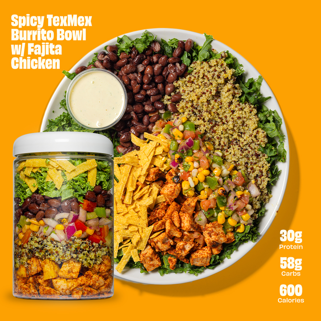 Spicy TexMex burrito bowl with black beans, quinoa, chicken, and salsa on a bright background.