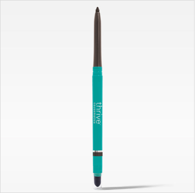 A Thrive Causemetics eyeliner pencil with a teal body and a dark brown tip, standing upright.