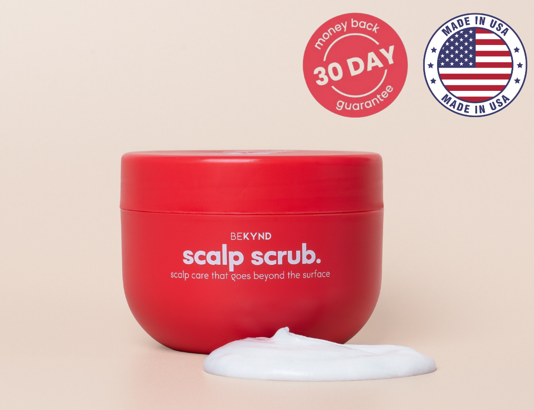 Red container of scalp scrub with cream, 30-day guarantee, Made in USA badge.