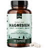 A bottle of Rhythm Triple Calm Magnesium supplements with two capsules next to it on a white background.